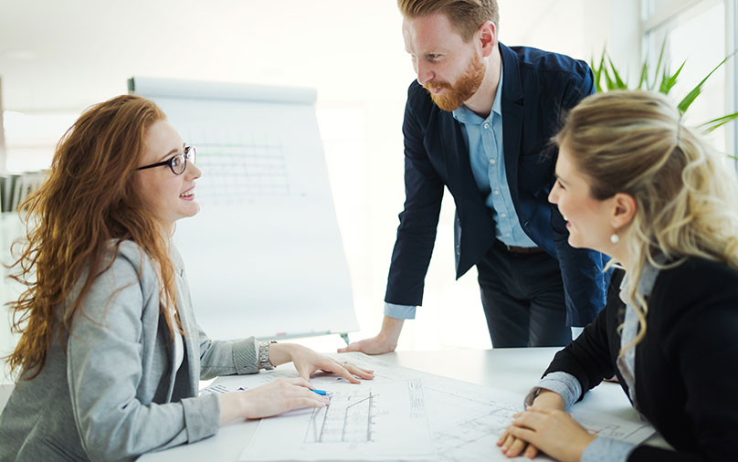 Group of young architects working on business meeting